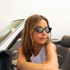 Model wearing PAIGE sunglasses in Black Crystal
