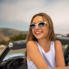 Model wearing PAIGE sunglasses in Pearl