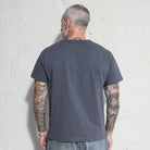 Premium Fitted Heritage Tee in Washed Black, back view on model