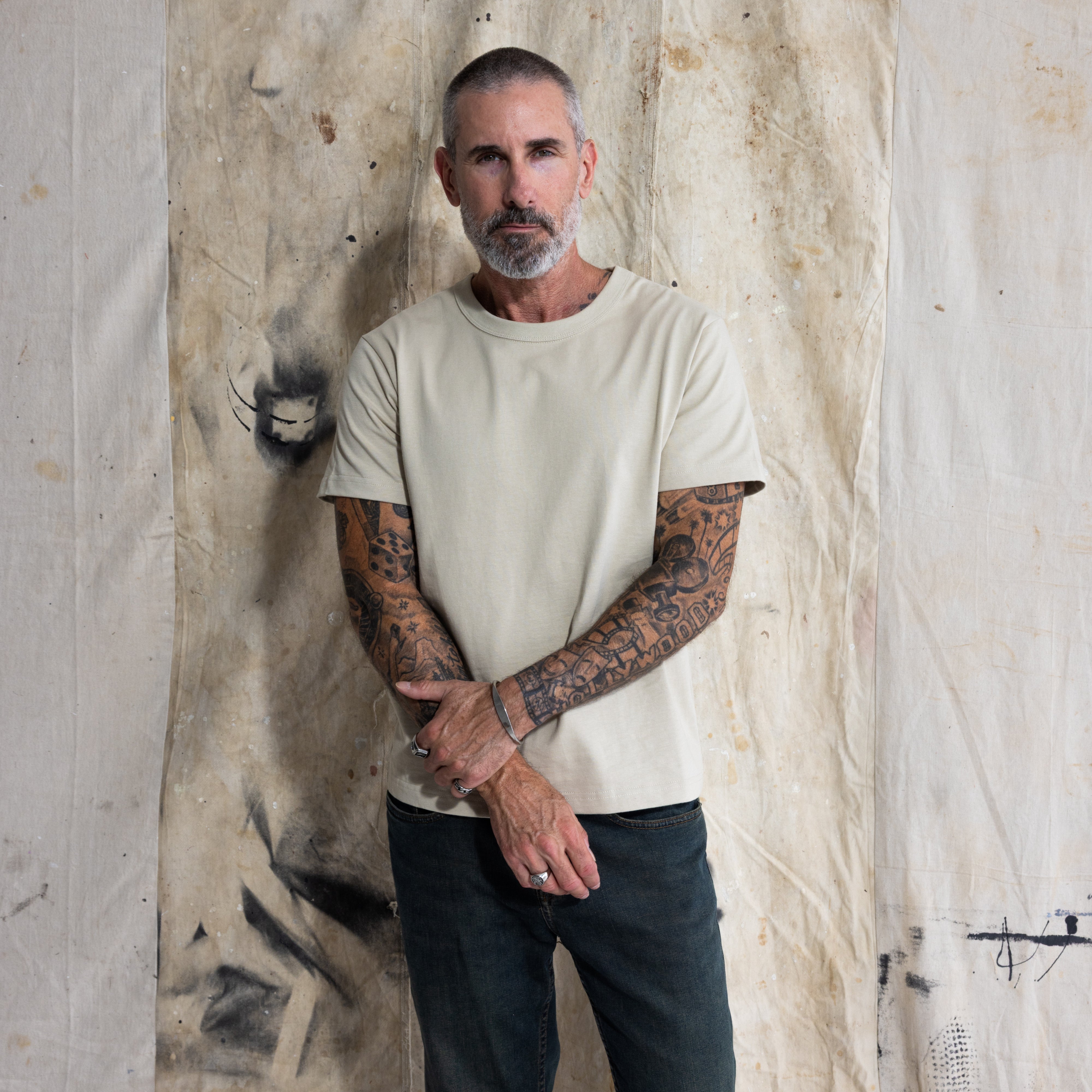Premium Fitted Heritage Tee in Heritage Sand, front view on model, three quarter