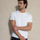 Premium Fitted Heritage Tee in Vintage White, front view on model, three quarter